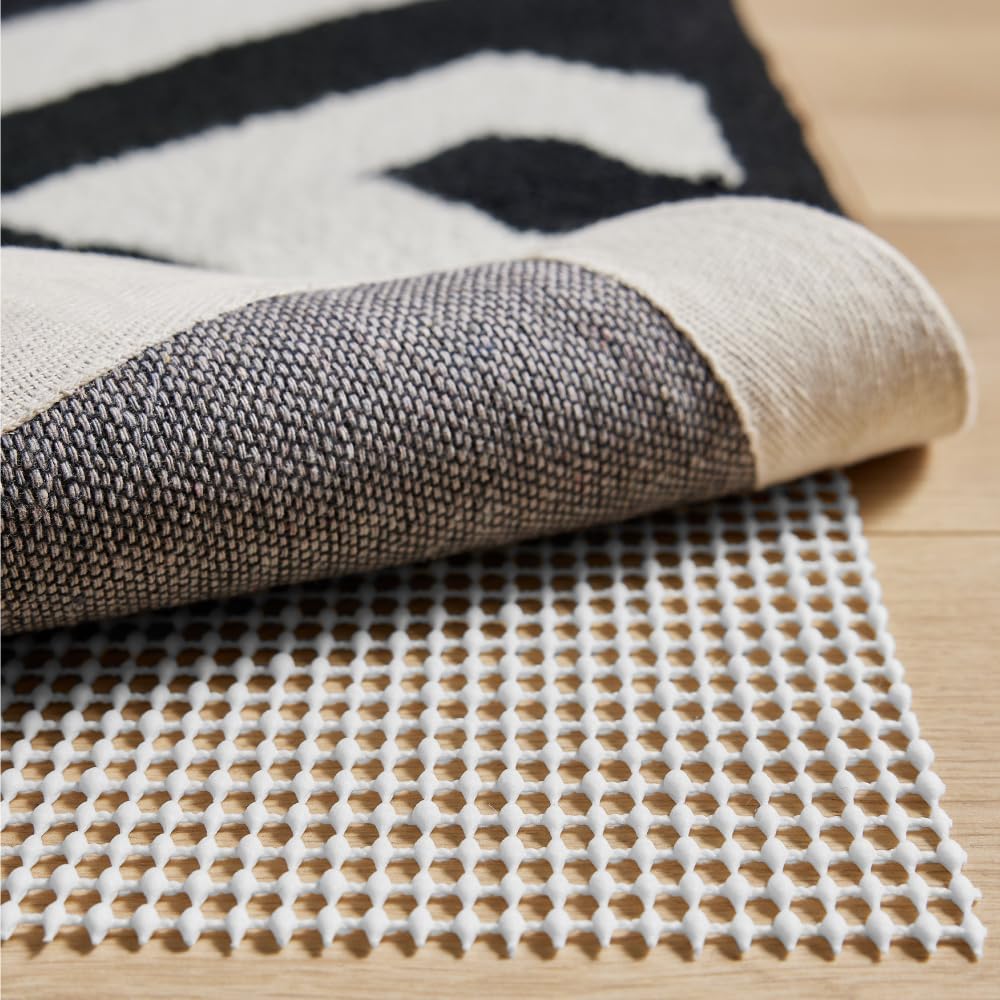 GORILLA GRIP Strong Rug Pad Gripper, US Designed, Grips Help Keep Area Rugs Safe and in Place, Slip and Skid Resistant Pads for Hard Floors, Under Carpet Mat Cushion and Hardwood Protection 2×3 FT
